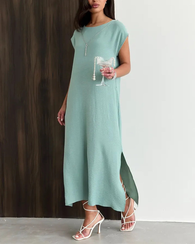Mint green loose maxi dress with side slit, back view