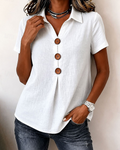 White lapel three-button solid short sleeve blouse, front view