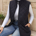 Black diamond-quilted longline vest, front view