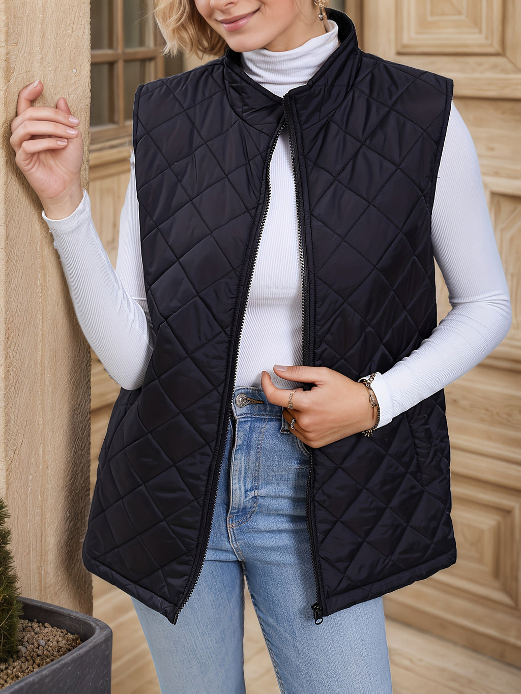 Black diamond-quilted longline vest