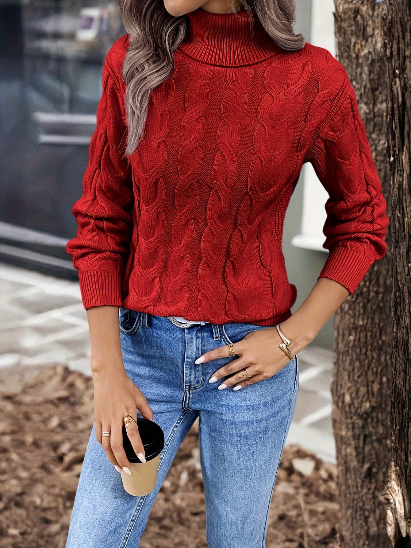 Red cozy cable-knit turtleneck sweater