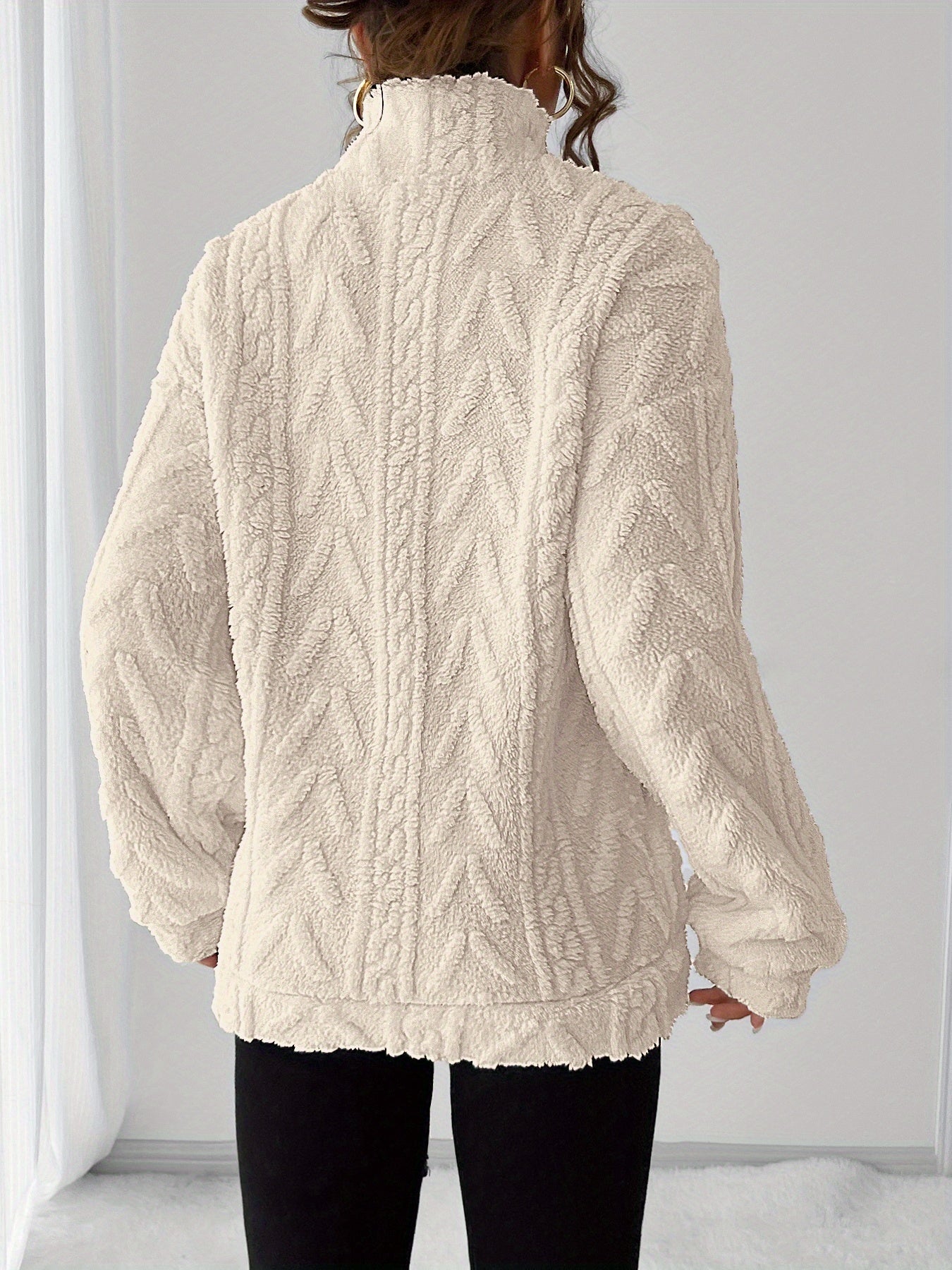 Cream cozy textured pullover, front view