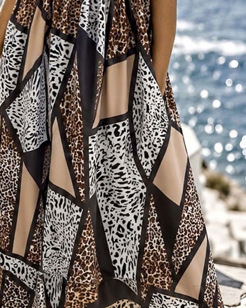 Black leopard print full skirt maxi dress, side view