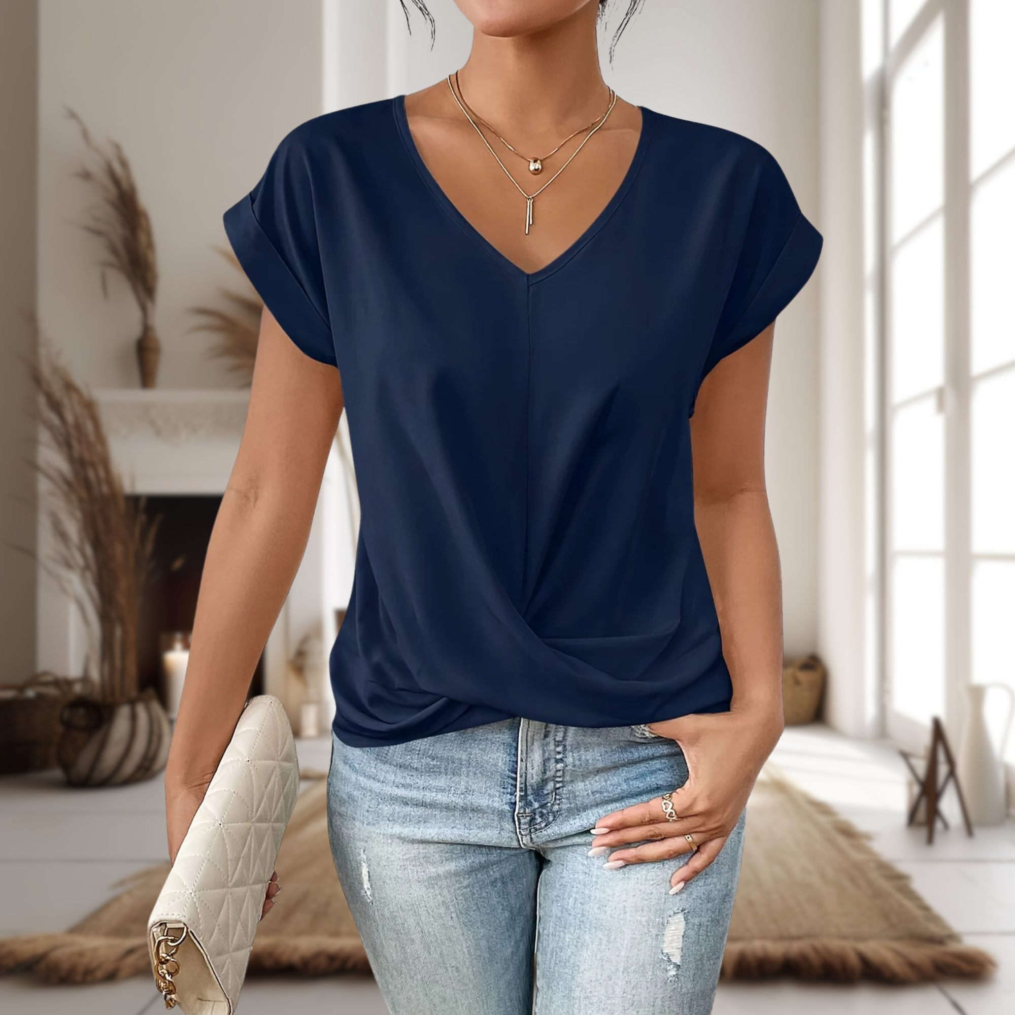 Elegant twist hem summer blouse in blue, front view