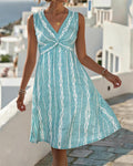 Blue V-neck sleeveless print knee-length dress, front view