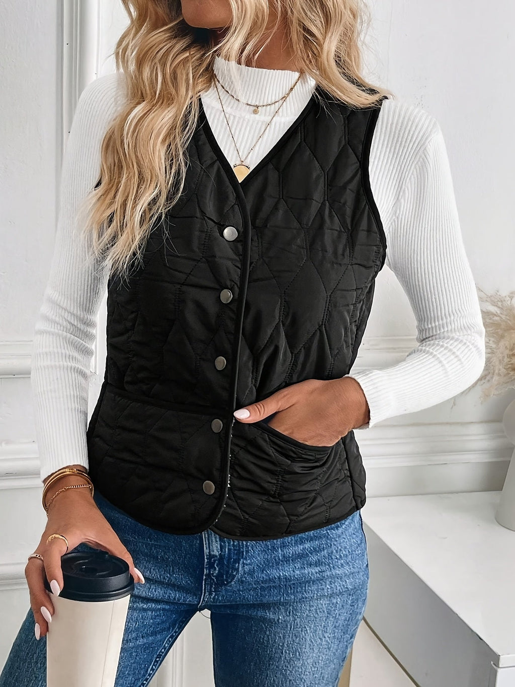 Black reversible quilted vest