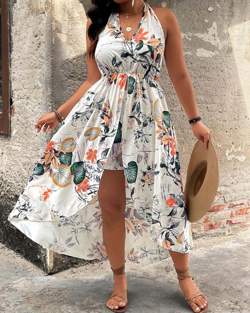 Green printed halter neck A-line mini dress and shorts set, front view