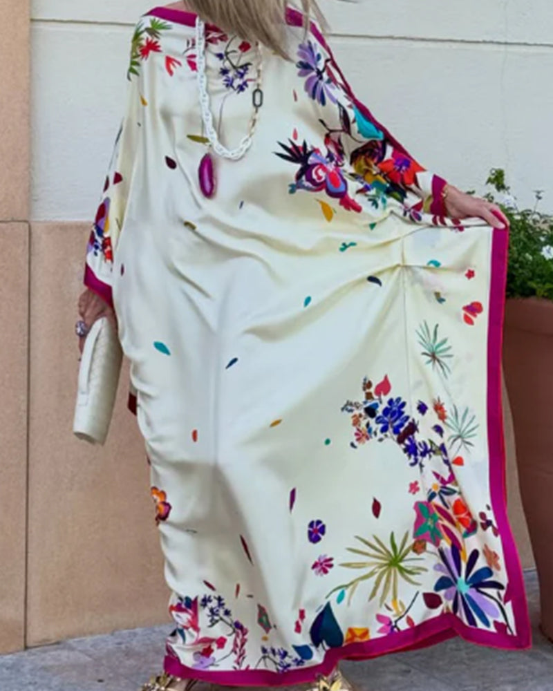 Fuchsia off-shoulder maxi dress close-up print detail