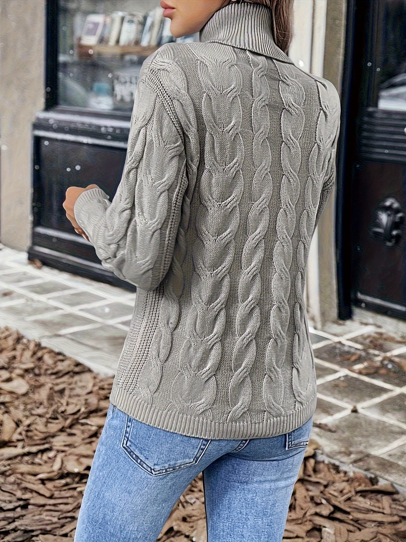Red cozy cable-knit turtleneck sweater