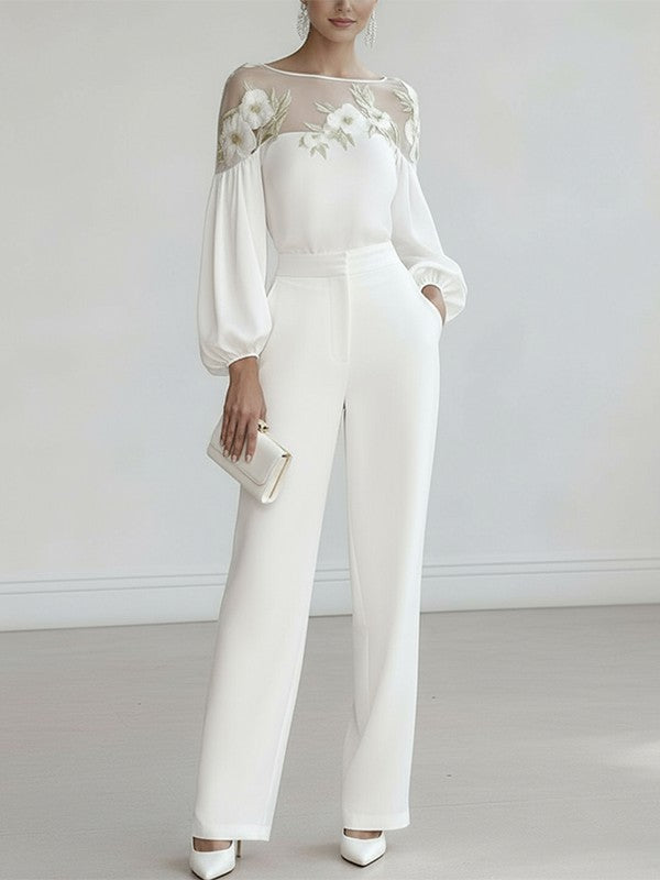 White floral applique mesh puff sleeve blouse, styled front view with clutch