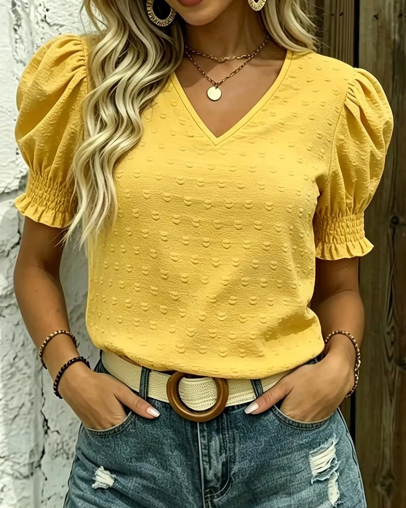 Yellow V-neck bubble sleeve jacquard blouse, front view