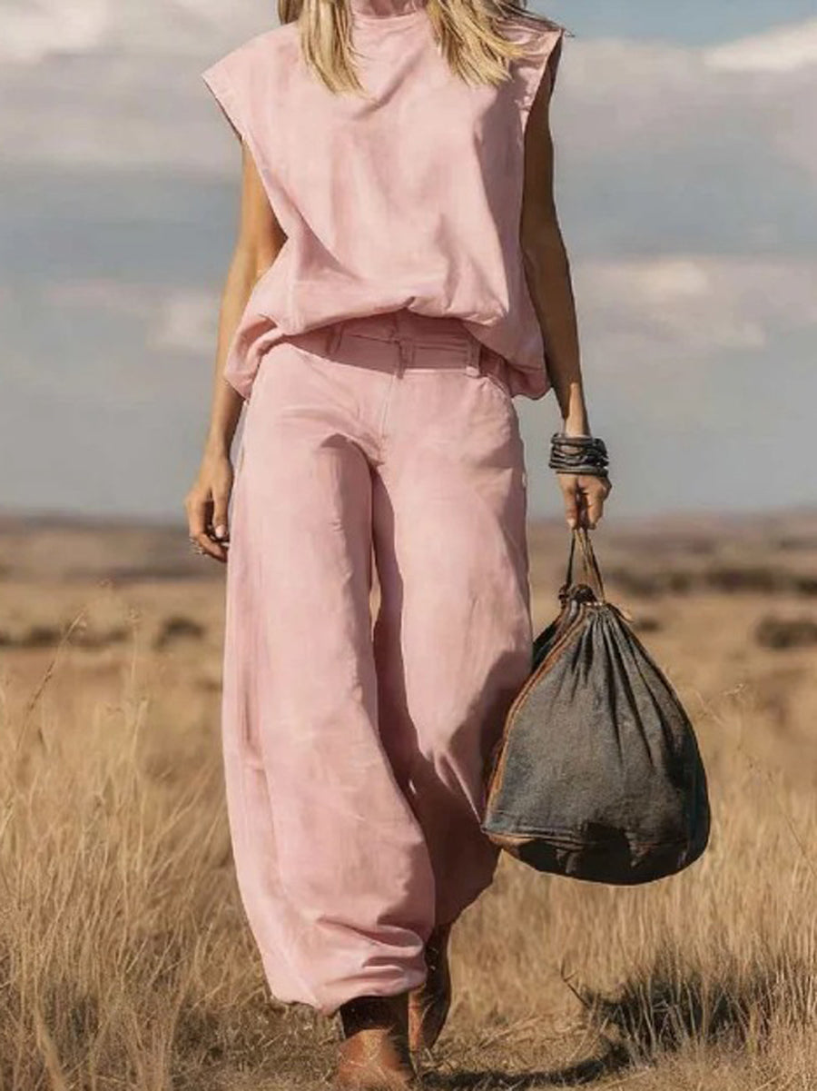 Pink denim mock-neck vest top and wide-leg jeans co-ord set