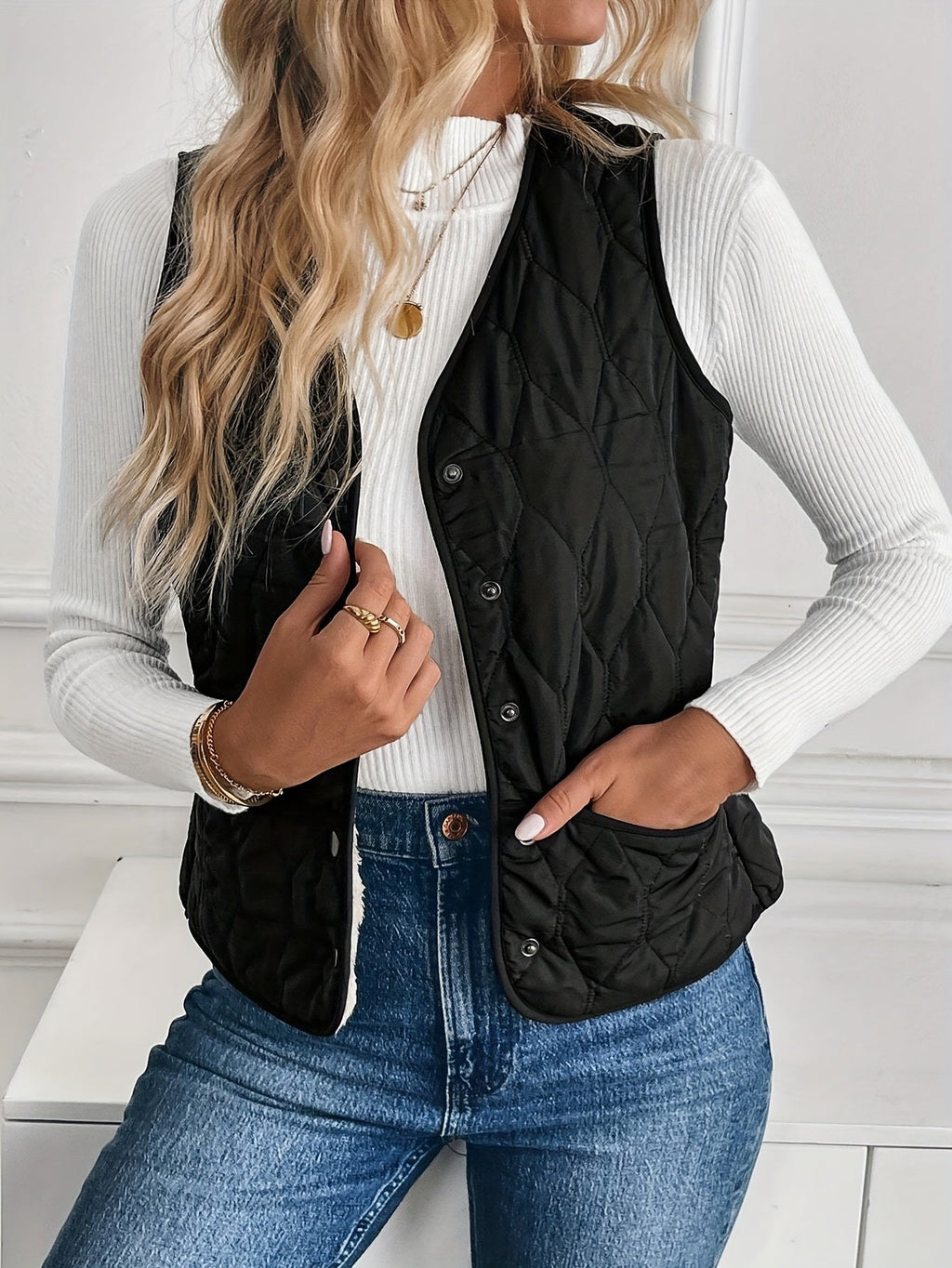 Black reversible quilted vest