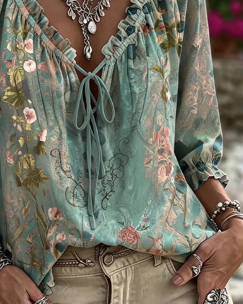 Green 3/4 sleeve floral blouse with drawstring hem, back view