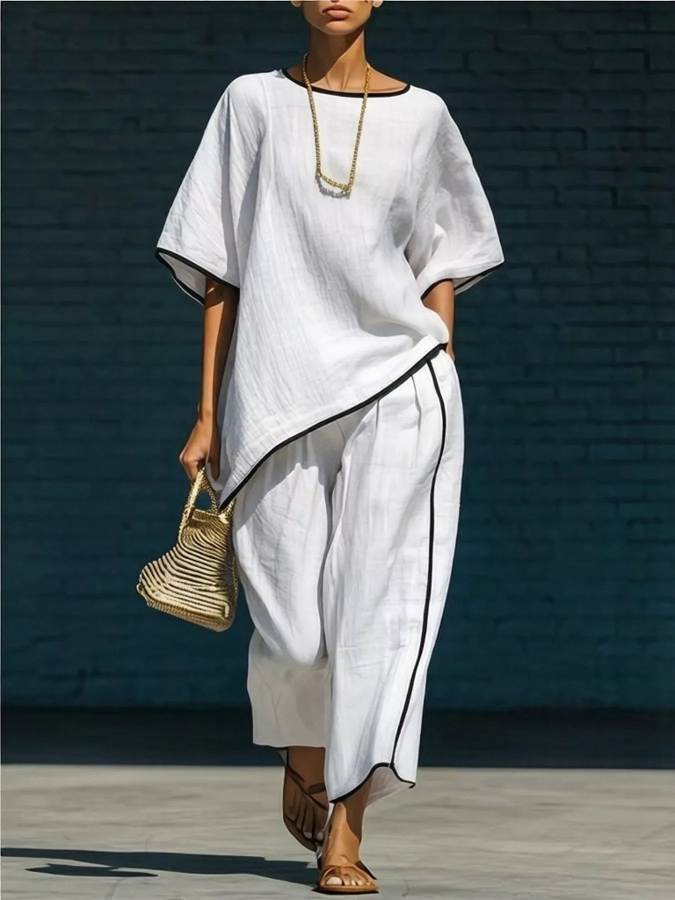 White contrast trim round neck top and trousers co-ord set, front view
