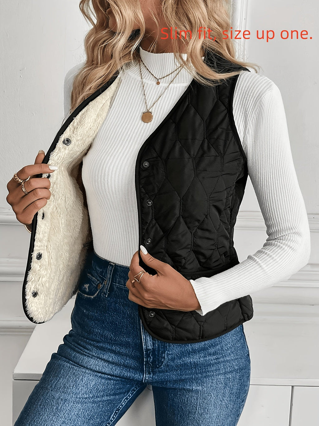 Black reversible quilted vest