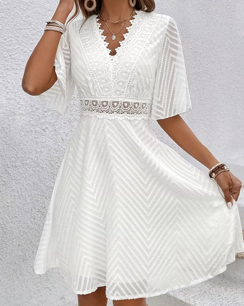White lace patchwork mini dress, side view