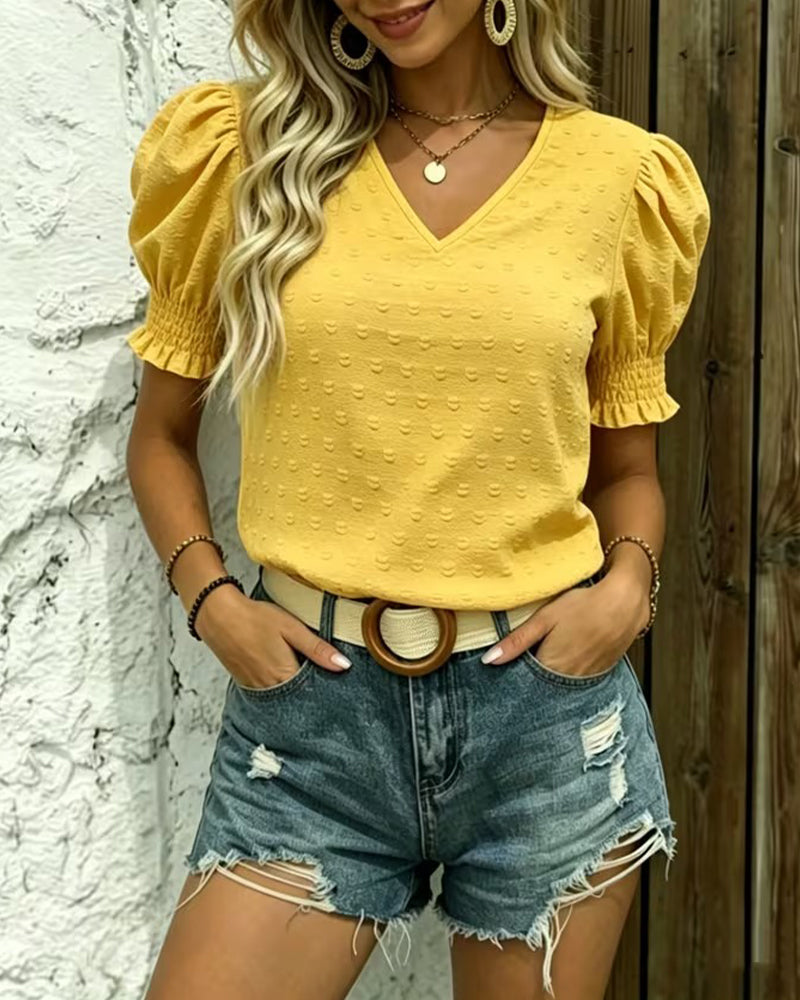 Yellow bubble sleeve jacquard texture blouse, side view