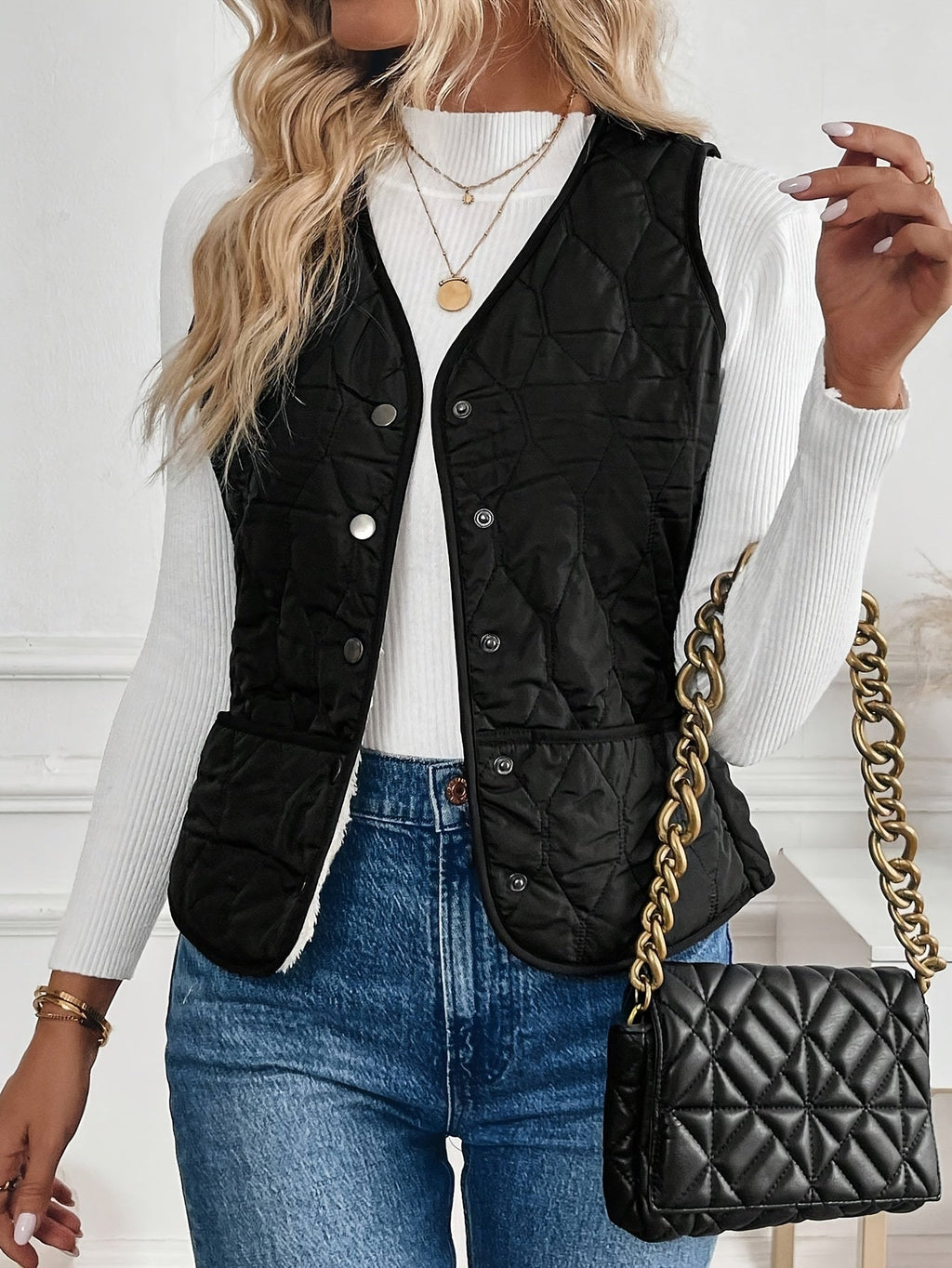 Black reversible quilted vest
