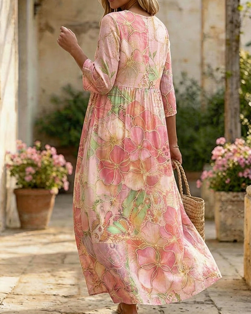 Pink floral full skirt maxi dress, side view
