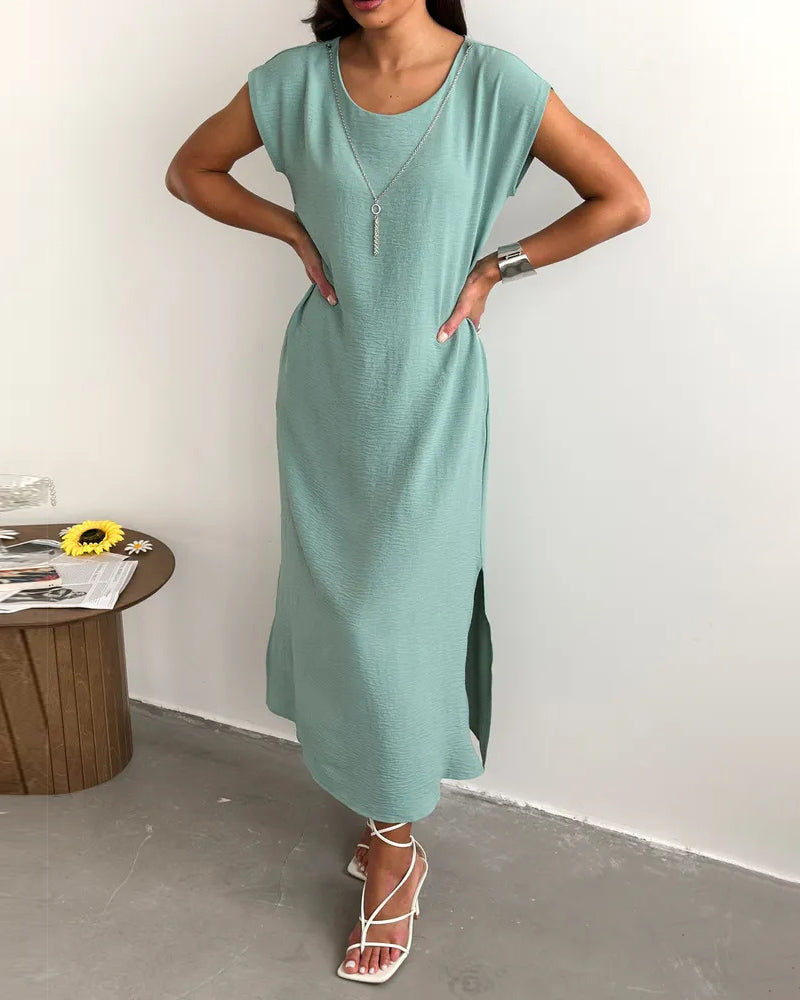 Mint green solid round neck short sleeve slit maxi dress, front view