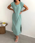 Mint green solid round neck short sleeve slit maxi dress, front view