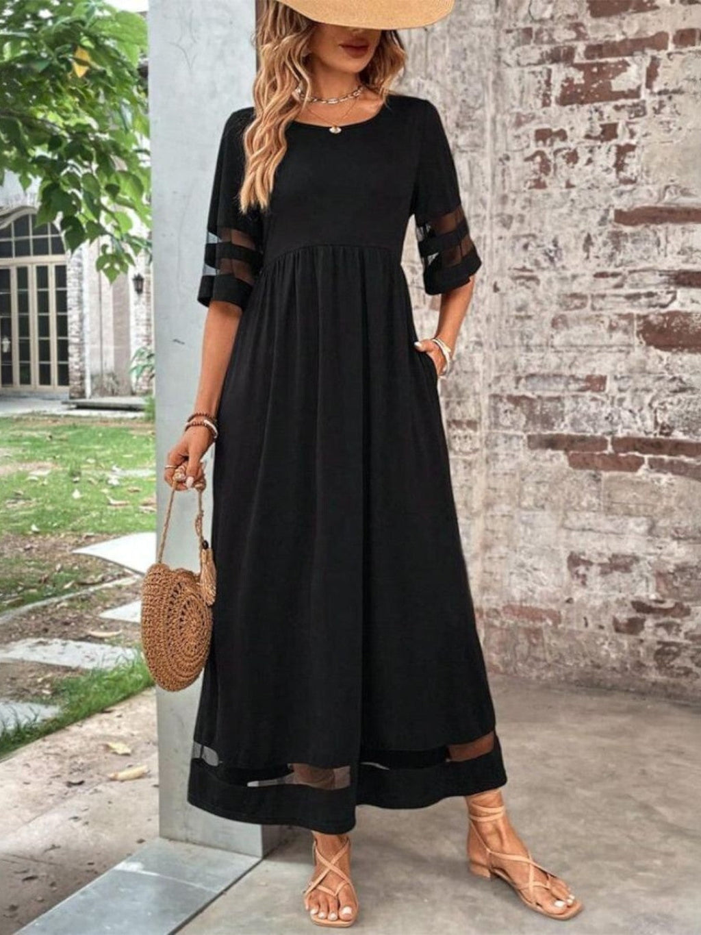 Elegant sheer panel maxi dress in black, front view