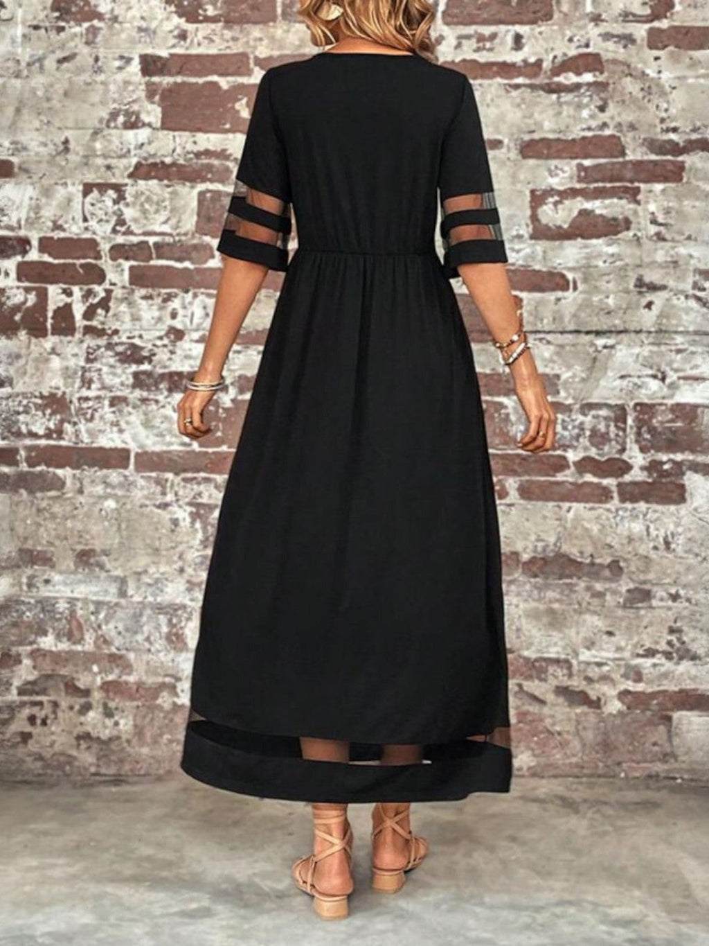 Black sheer panel maxi dress, side view