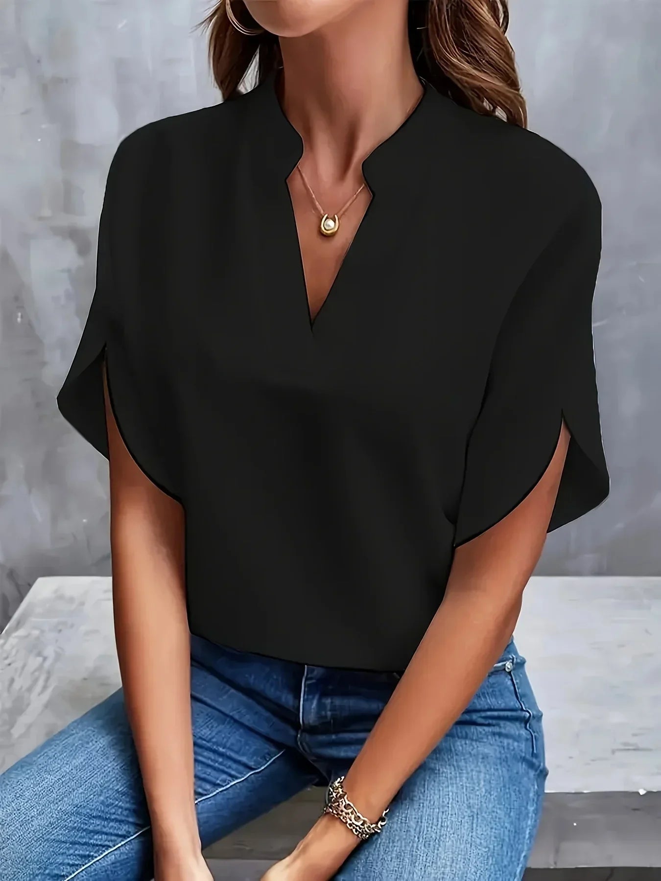Blue split sleeve V neck blouse, side view