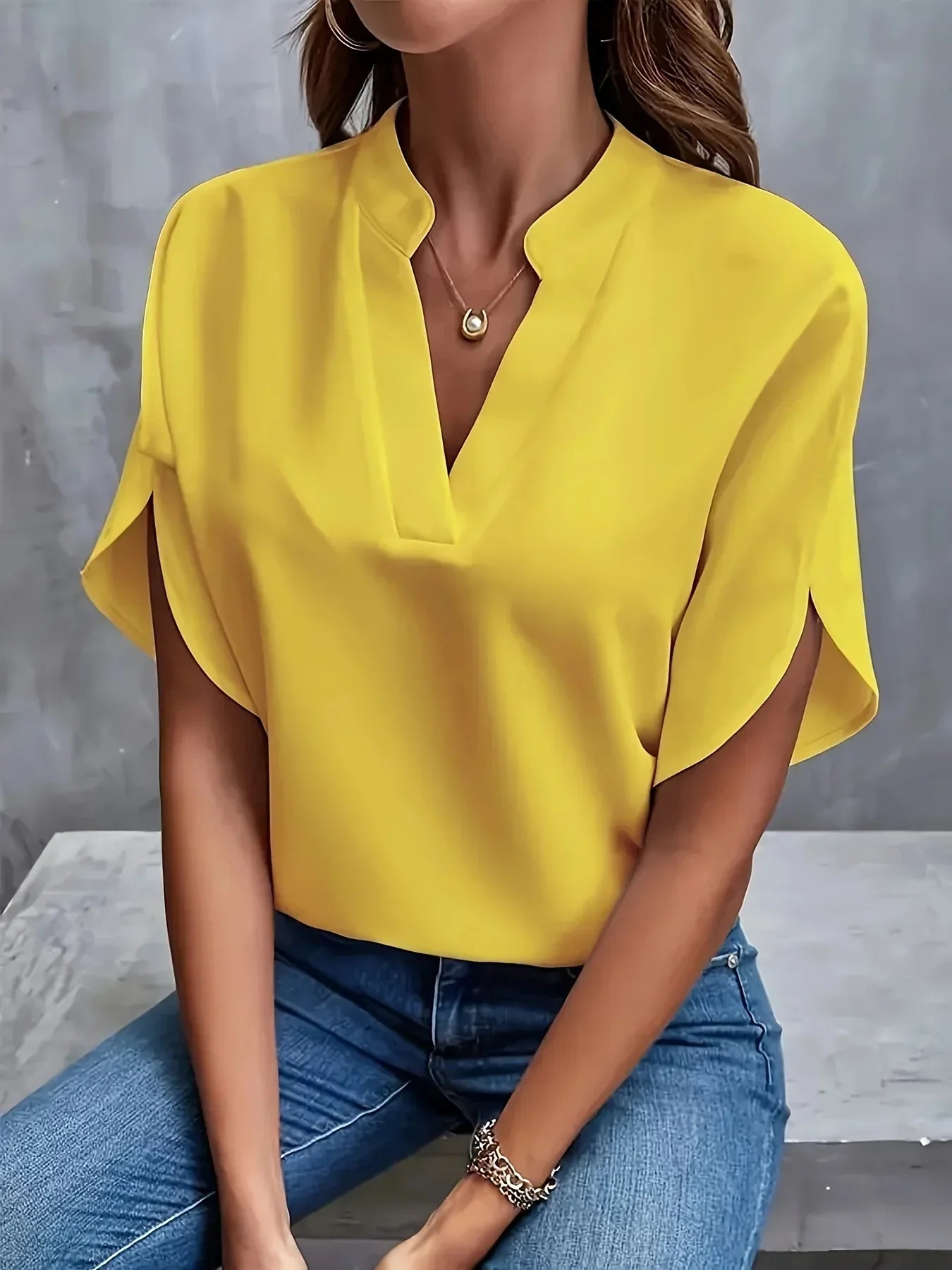 White elegant V neck split sleeve blouse, front view