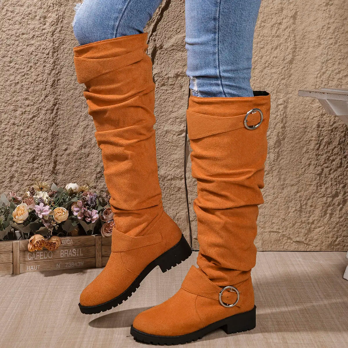 Orange slouchy knee-high Boots