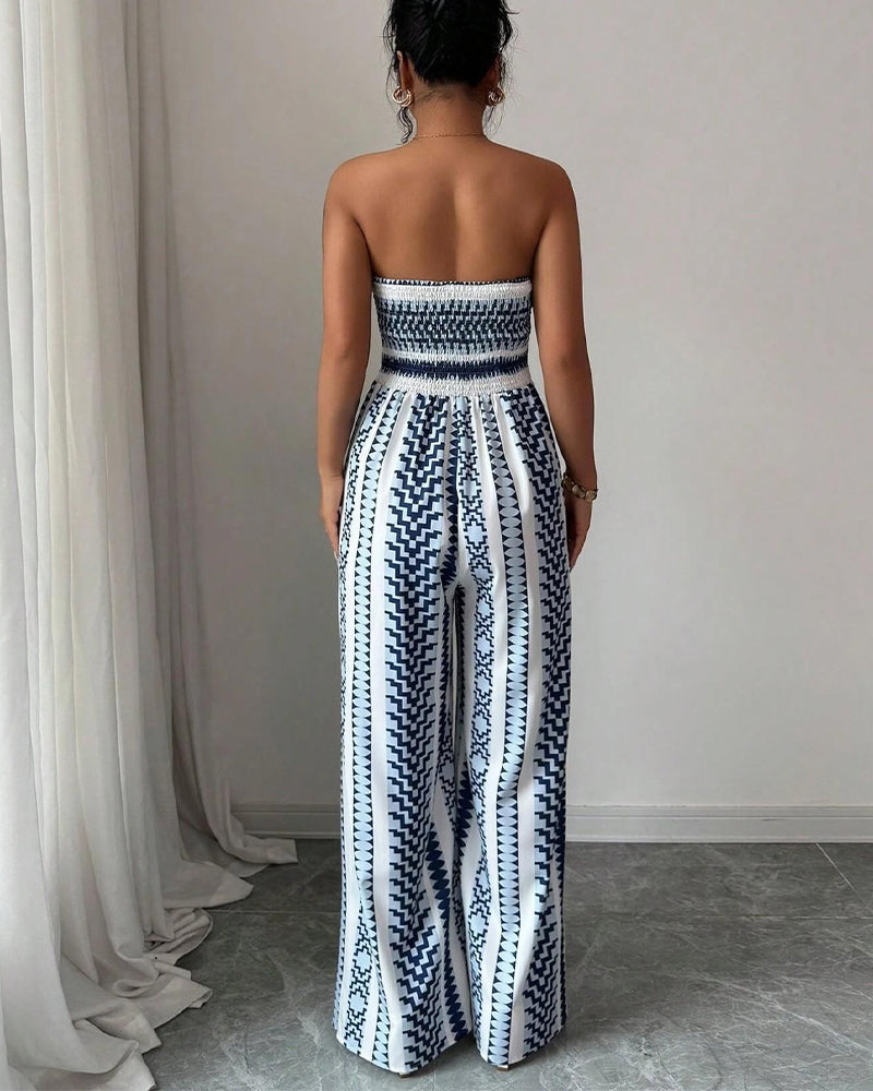 Blue geometric print sleeveless jumpsuit, side view