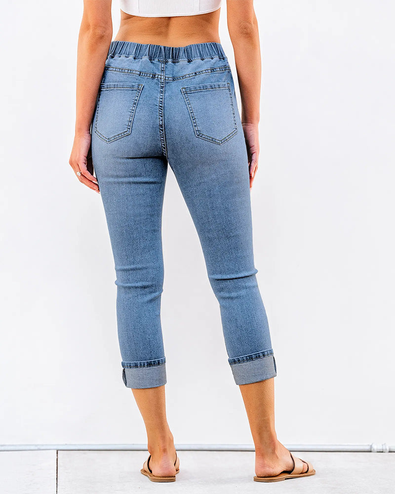Blue elastic waist capri jeans for women, full length view