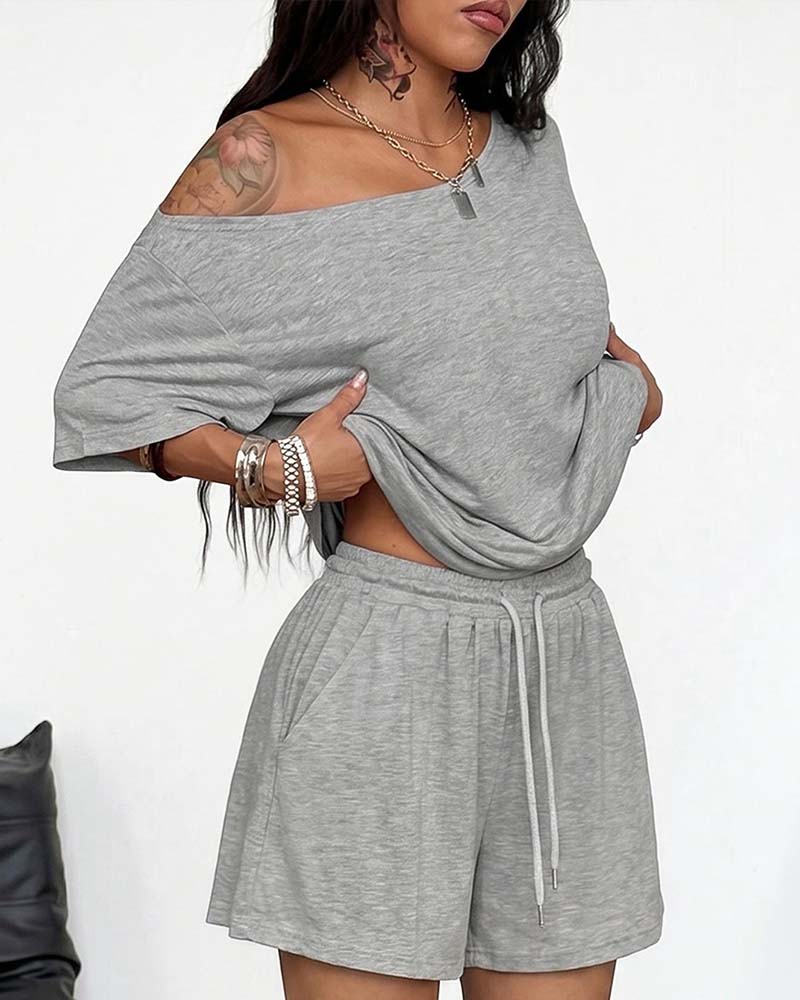 Gray one-shoulder batwing sleeve loose shorts set, front view