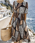 Black geometric patchwork leopard print maxi dress, front view