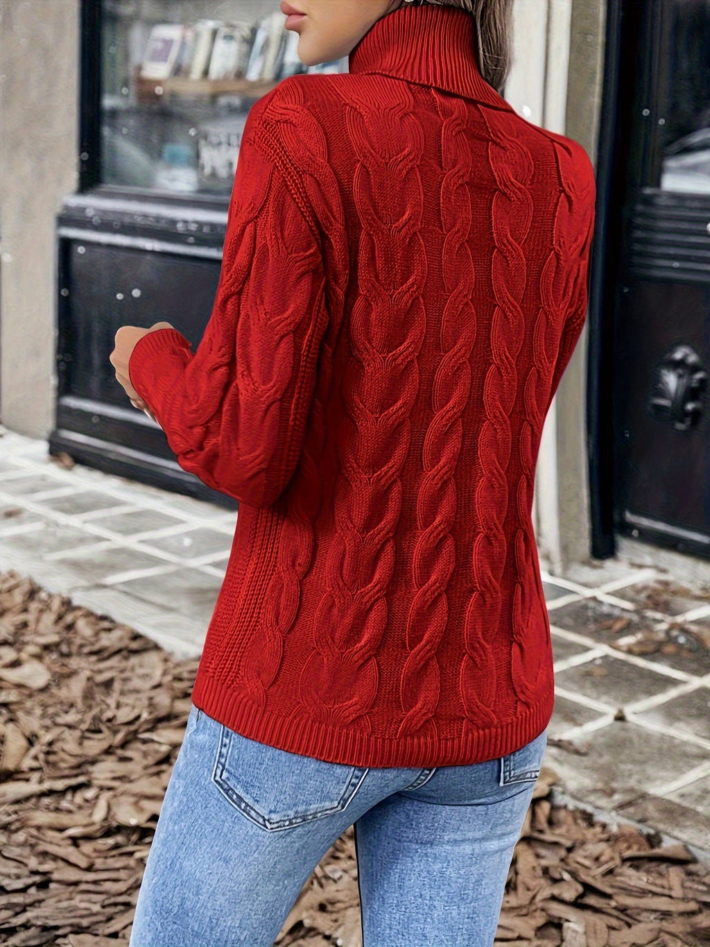 Red cozy cable-knit turtleneck sweater