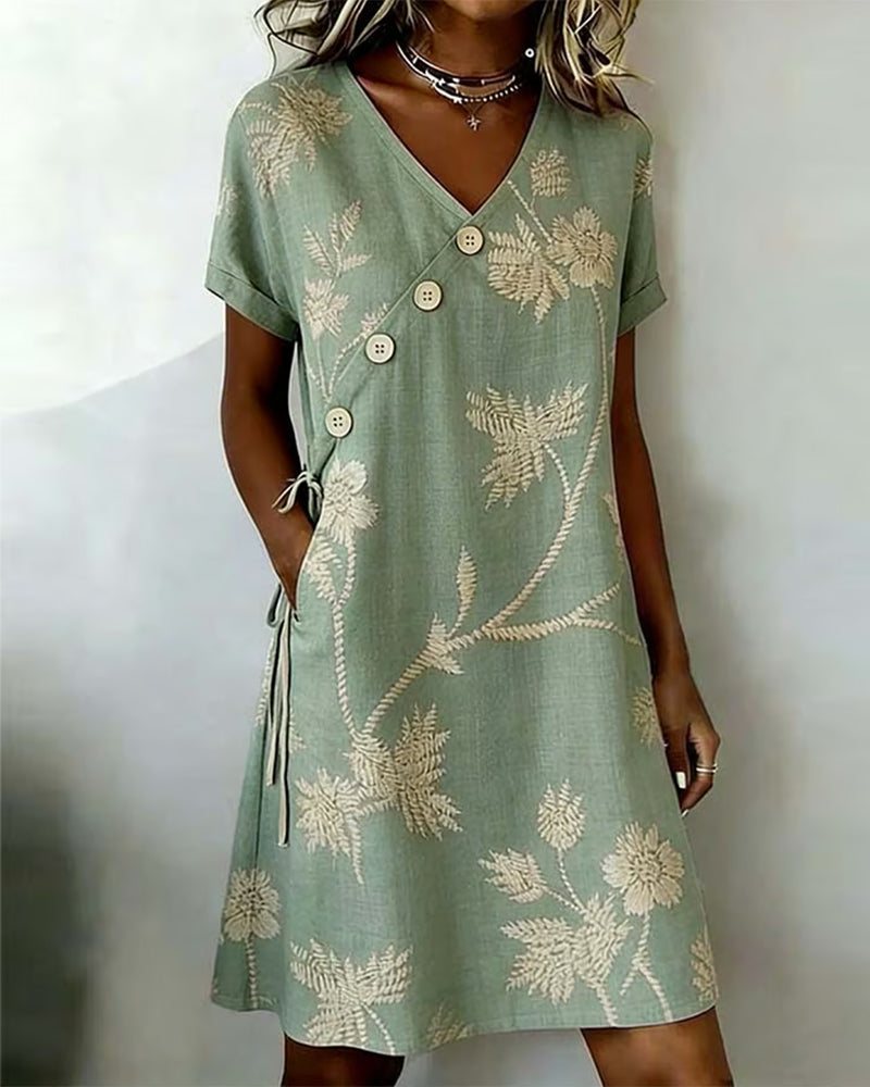 Green diagonal button print V-neck midi dress, front view