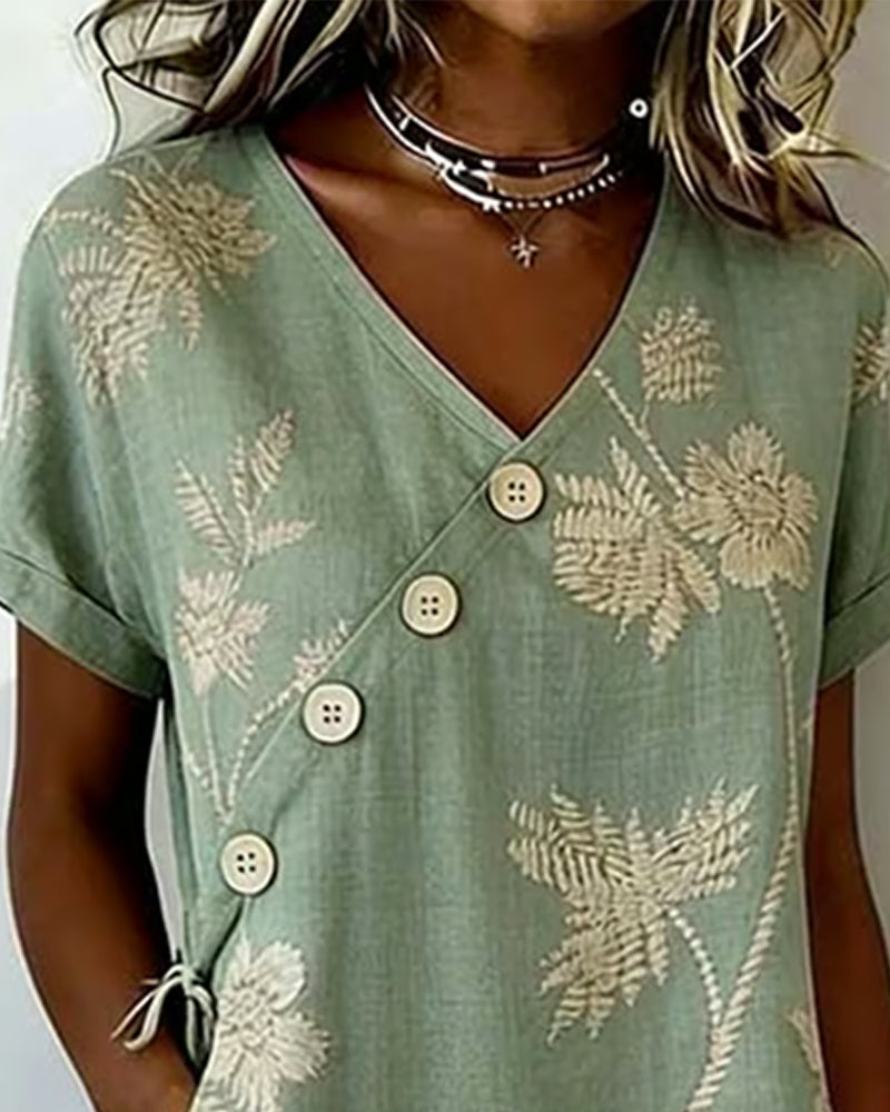 Green short sleeve midi dress with diagonal button detail, side view
