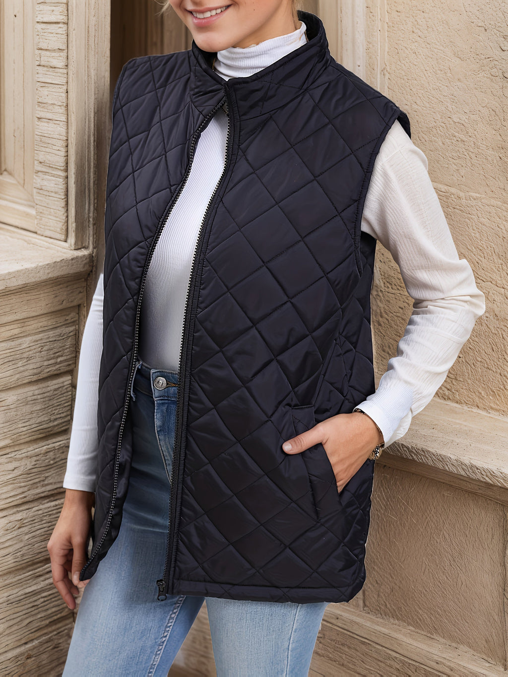 Black diamond-quilted longline vest