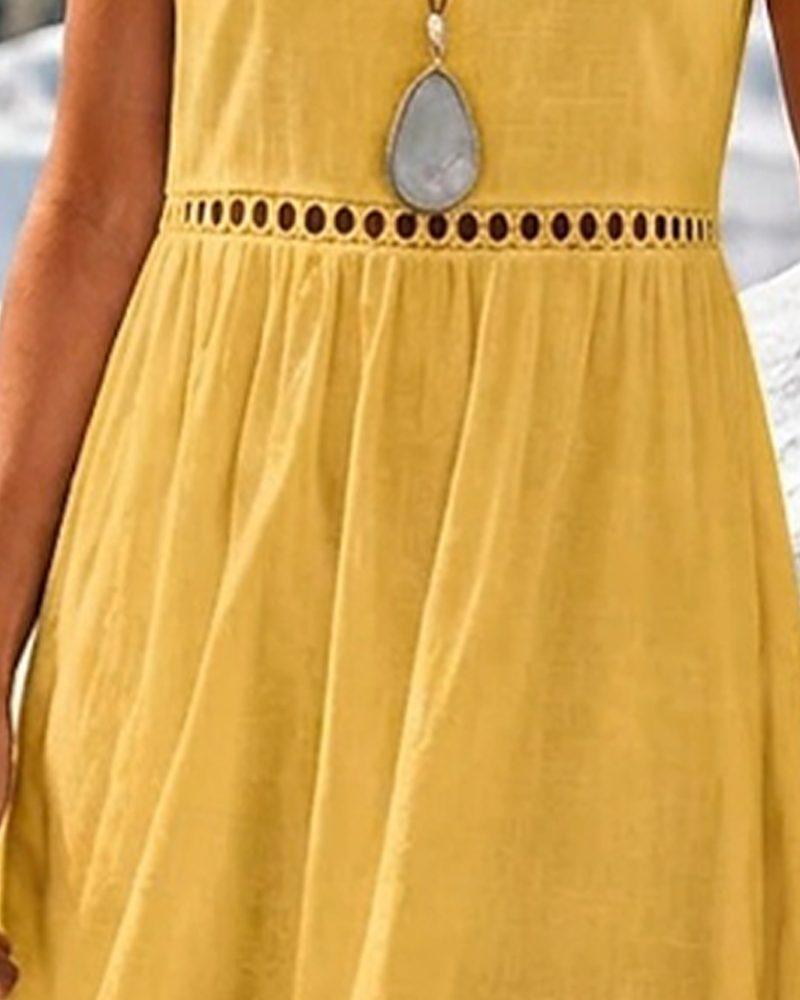 Yellow short sleeve A-line midi dress with cut-out waist, side view
