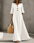 White V-neck button ruffle full skirt maxi dress, front view