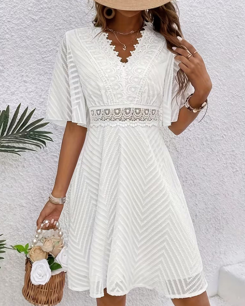White lace patchwork cutout V-neck dress, back view