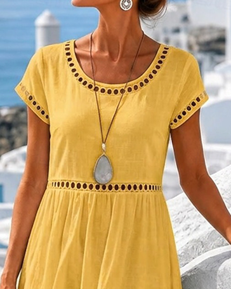 Yellow crew neck midi dress cutout waist detail close-up