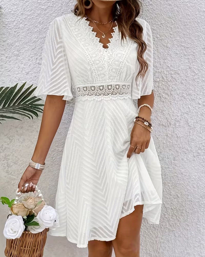 White lace patchwork half sleeve mini dress, full length view