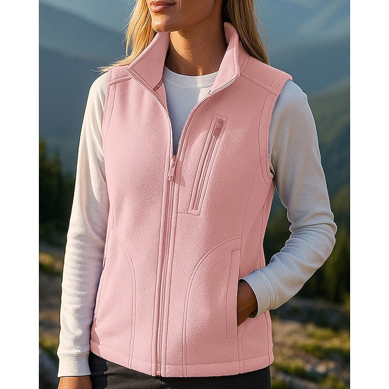 Pink zip-up vest, close-up of stand collar and zip pockets