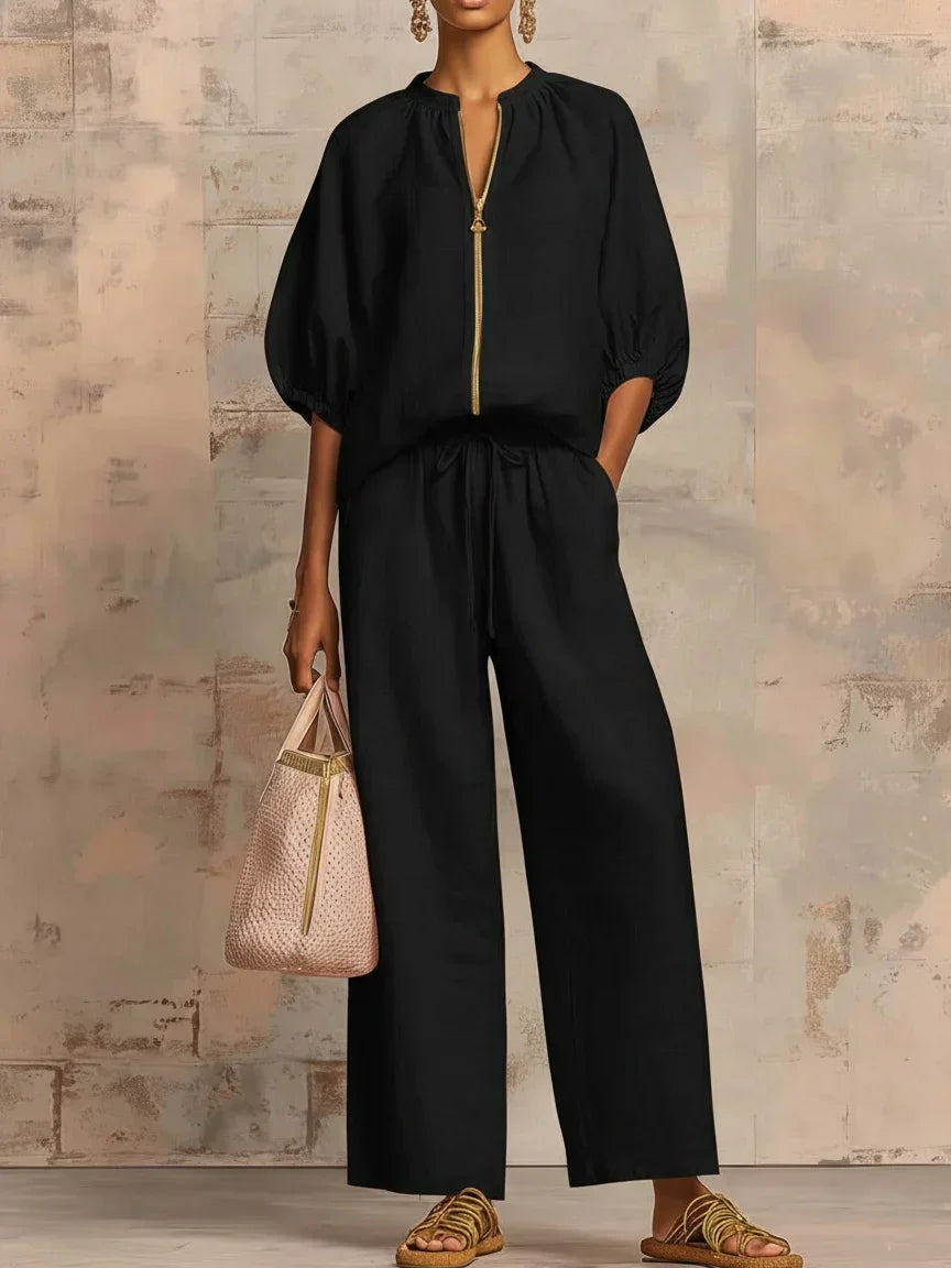 Black zip-front two-piece co-ord set