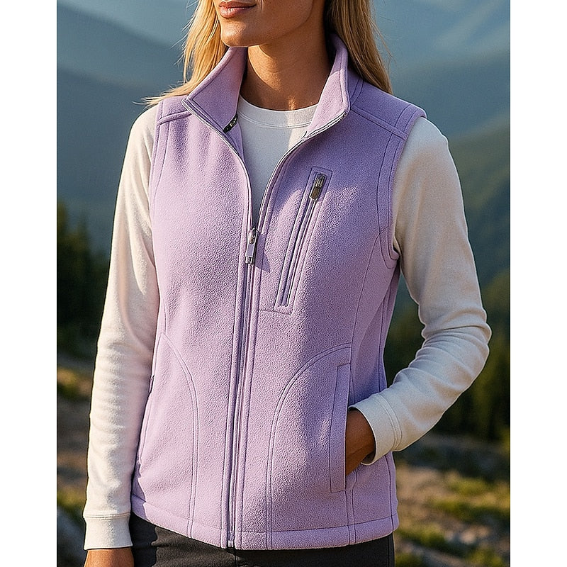 Purple zip-up vest, close-up of stand collar and chest zip pocket