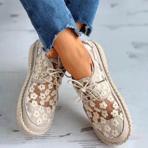 White floral embroidered lace-up Sneakers, front view