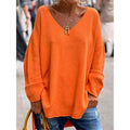 Orange relaxed V-neck pullover, front view